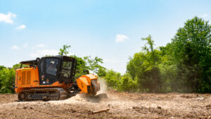 FAE mulching machine outside clearing vegetation in an outdoor environment to support land management and mulching equipment selection decisions
