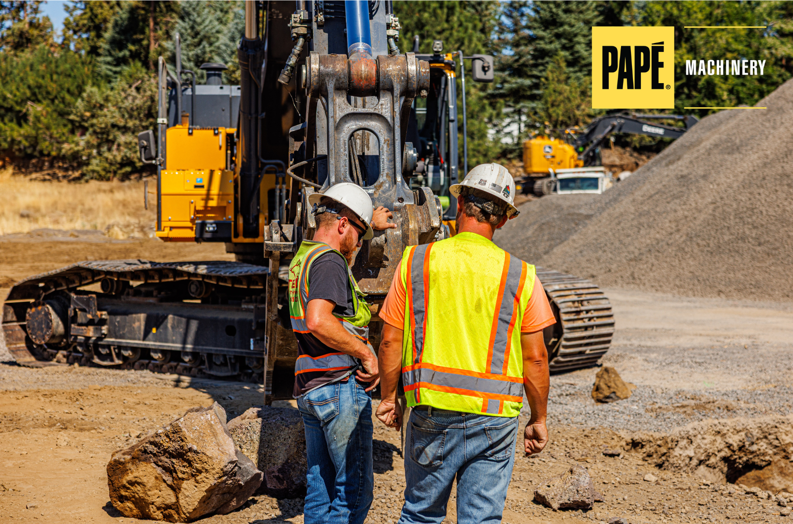 Construction crew conducting a jobsite safety meeting and equipment inspection during OSHA Safe + Sound Week to improve workplace safety